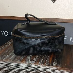 Elegant Black Cosmetic Bag With Gold-toned Metal Hardware